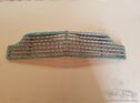 Peugeot 203C radiatorgrille circa 1955