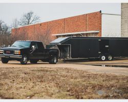 1999 GMC Sierra 3500 SLT Crew Cab Pickup with Triple B Custom Enclosed Trailer | RM Sotheby's The Guyton Collection