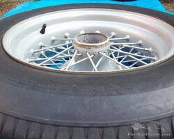 Dunlop style competition wire wheel with dunlop racing tyre. Morgan, Healey, Cobra,