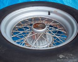 Dunlop style competition wire wheel with dunlop racing tyre. Morgan, Healey, Cobra, etc, etc.