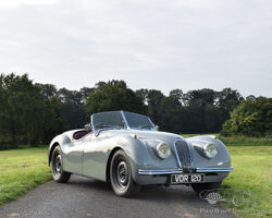 XK120 redefined: 3.8 litre, 5 speed box, disc brakes.