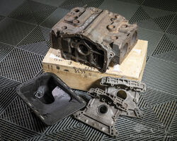1 Alfa Romeo Alfasud 1500 engine block, 1 Alfasud oil pan and 2 carters, sold individually | Wannenes Auction July 16