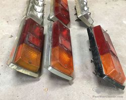 Daf 55 / 66 ? onderdelen; waaiers, koplampen, achterlichten en grill delen