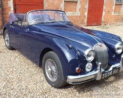 A really lovely dark blue Jaguar XK150 drop head coupe which has to be seen to be appreciated!