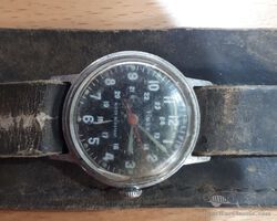 TIMEX wristwatch with leather cuff ca. 1950, in working order, glass damaged