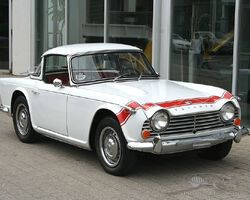 1965 Triumph TR4A | Christmas Around the World | Sonicbidder.com auction