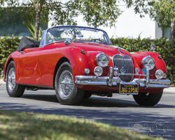 1958 Jaguar XK150 3.4 Drophead Coupe | Quail Lodge Auction 2022 | Bonhams | August 19, 2022