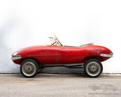 A Jaguar E-type Series I Roadster Child's Pedal Car By Tri-ang, British, C.1960s | The Audrain Concours Auction 2022 | Bonhams | Sept 30, 2022