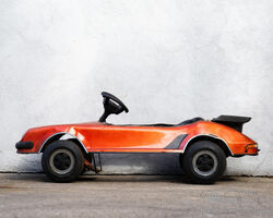 A Porsche 930 Cabriolet Child's Electric Car By Prestige Mini Motors, Taiwanese, C.1970s | The Audrain Concours Auction 2022 | Bonhams | Sept 30, 2022