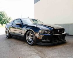 2013 Ford Mustang | Christmas around the world auction 2022 | Sonicbidder.com