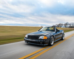 1990 Mercedes-Benz Pre-Merger AMG 500SL 6.0 Roadster with Hardtop | The Amelia Island Auction | Bonhams | March 2, 2023
