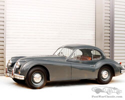 1955 Jaguar XK140 Coupé | Goodwood Members' Meeting Auction 2024 by Bonhams|Cars