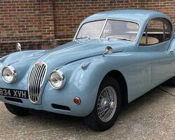 1955 Jaguar XK140 Fixedhead Coupé | The Summer Serenade; Windsorview Lakes 2025 | Historics Auctioneers