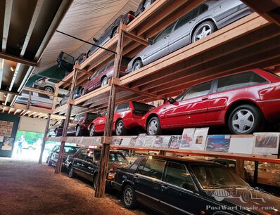 A collection of stacked Volvo cars