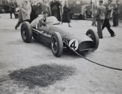 Smart suits and speedy cigars: a paddock mystery from the '50s