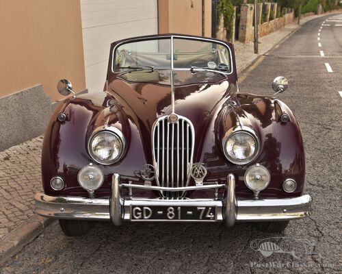 1957 JAGUAR XK140 MC DHC LEFT HAND DRIVE.
