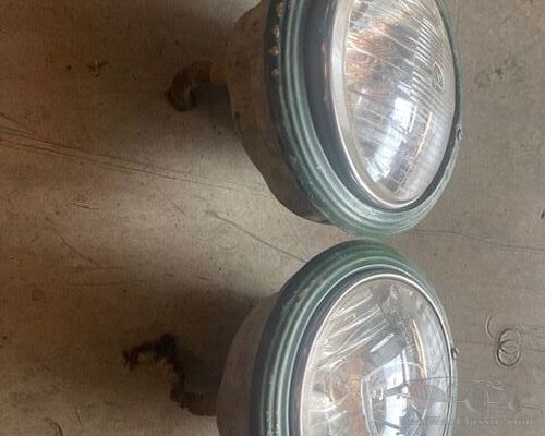 One pair of sealed beam Marchall headlights