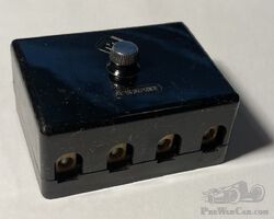 Black plastic fuse box - 4 way
